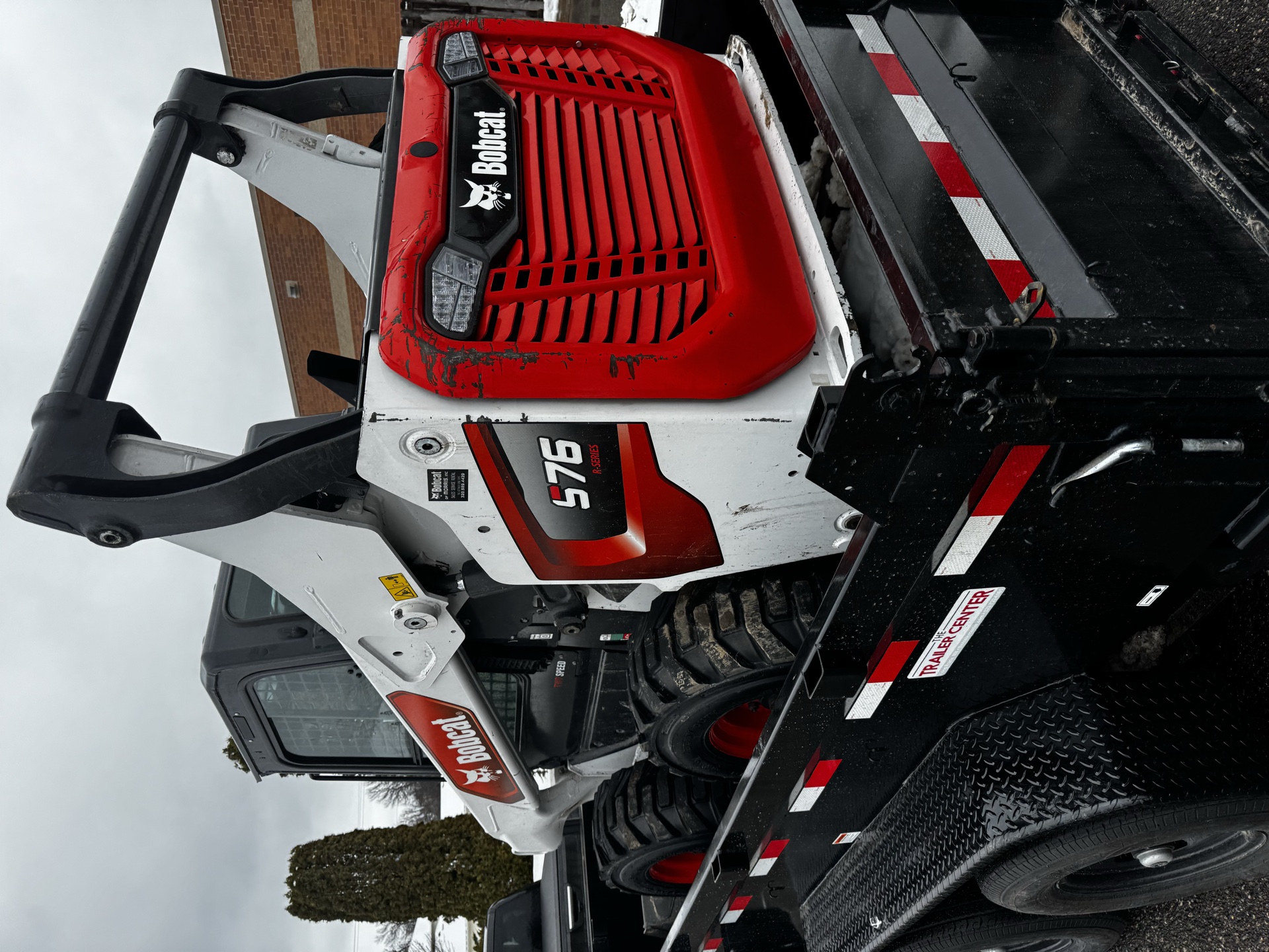 Skid loader services land clearing Minnesota