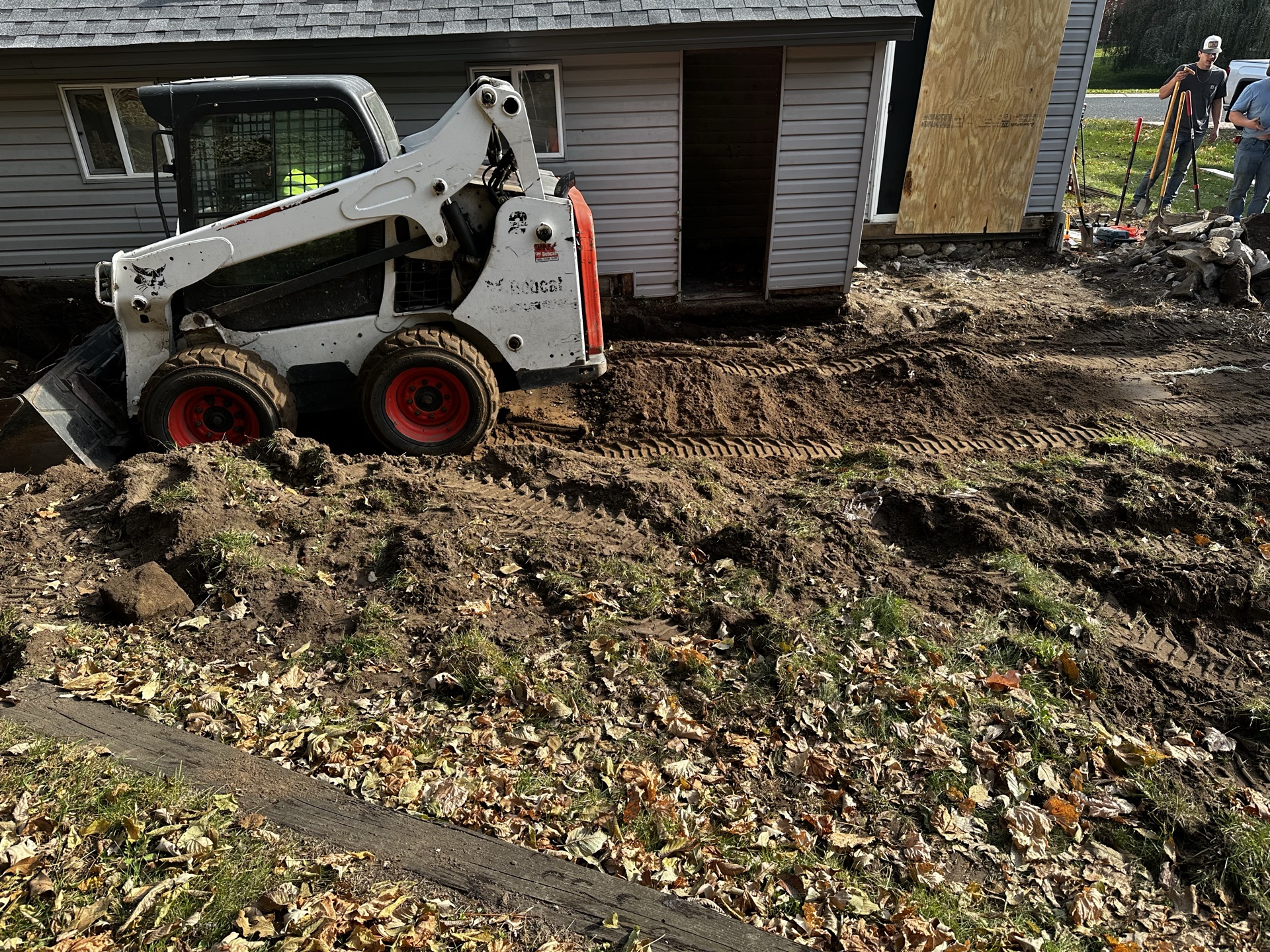 Bobcat excavating near home