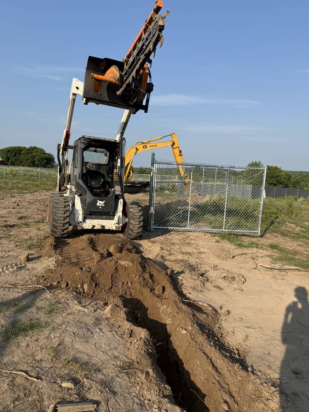 Trencher raised after finishing a section of the run