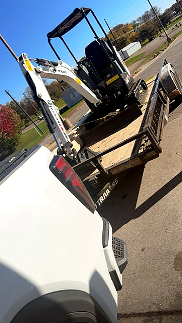 Mini excavator loaded on the trailer, ready for Monday